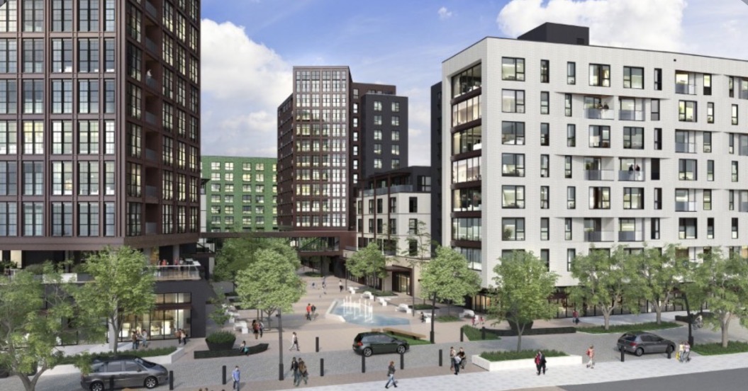 Rendering of a modern mixed-use residential community with multiple mid-rise buildings and a central plaza.